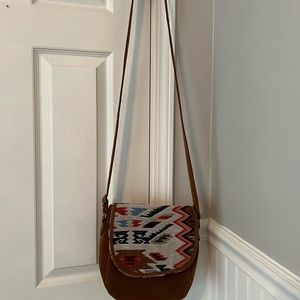tribal suede crossbody purse with snap closure